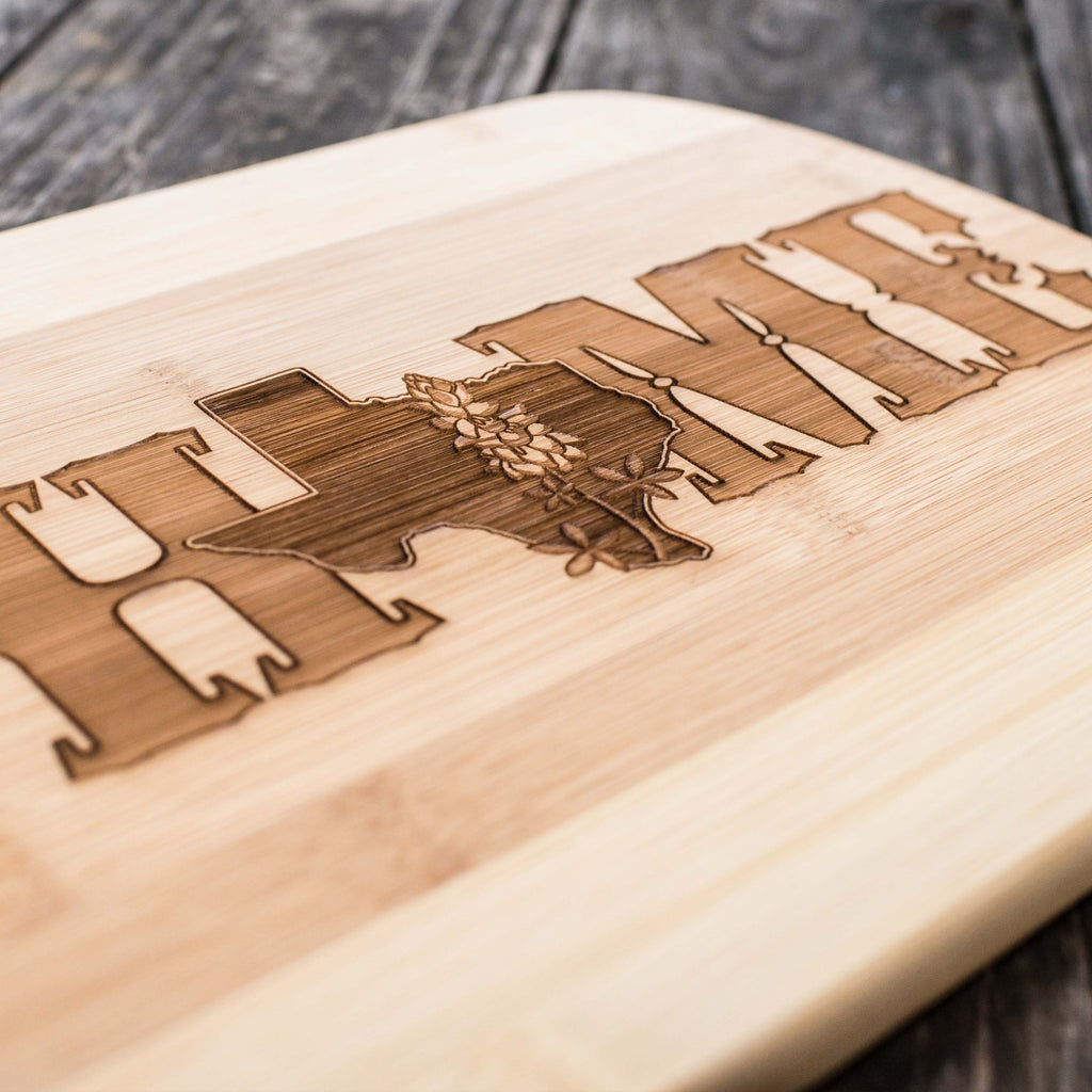 Texas Home with Bluebonnets - Cutting Board 14''x9.5''x.5'' Bamboo